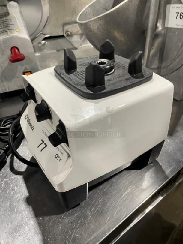 Vita-Mix VM0103 white countertop food prep machine, electric, on legs, 120V, with visible control dials.