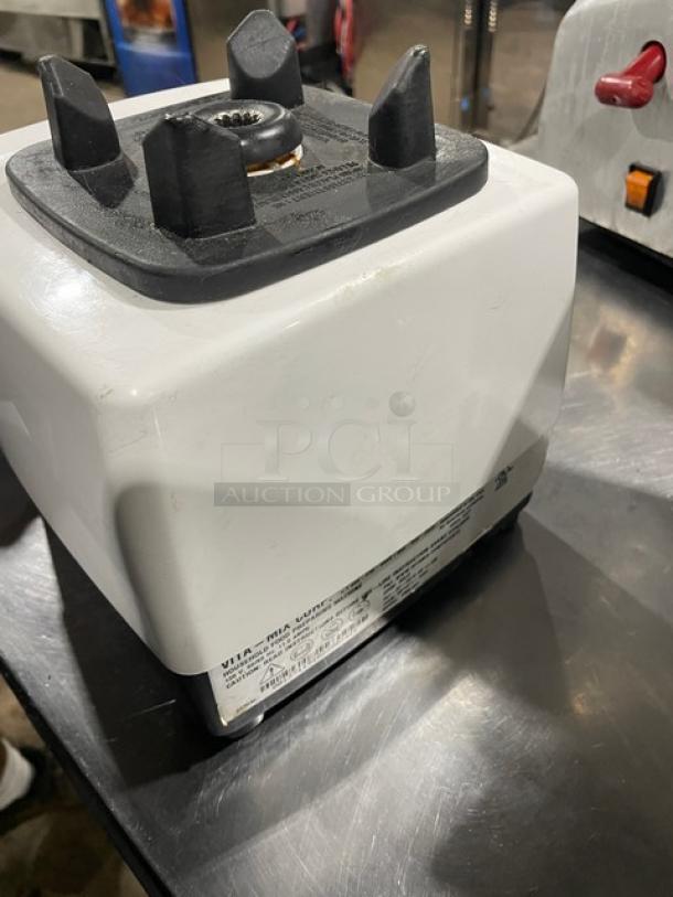 Vita-Mix VM0103 white commercial food prep machine, electric, countertop model, on legs, 120V, serial number visible.