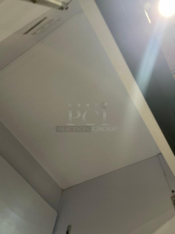 QBD Cooling Systems CD26HB commercial refrigerator interior, showing poly coated wired rack, single glass door model, 115V.