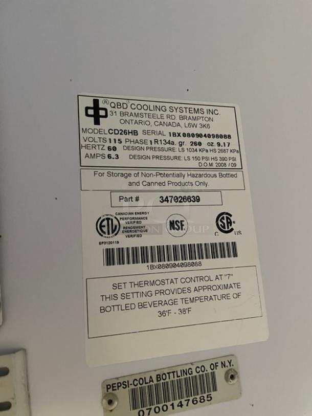 QBD Cooling Systems CD26HB reach-in refrigerator label detailing model, serial number, voltage, and certification marks.