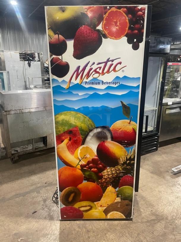 Mistic Style commercial white glass door refrigerator, poly-coated wired rack, fruit-themed exterior design, used condition.
