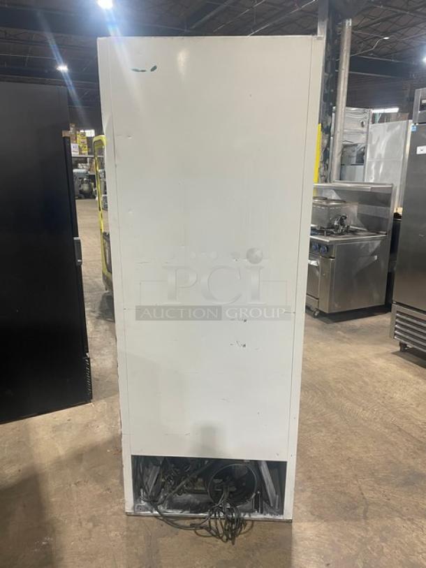 Mistic Style commercial single-door refrigerator, white, reach-in design, includes poly-coated wired rack, good condition.