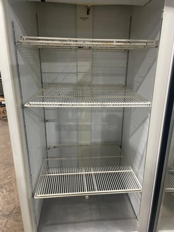 Mistic Style commercial white single glass door reach-in merchandiser refrigerator with poly-coated wire racks, used condition.