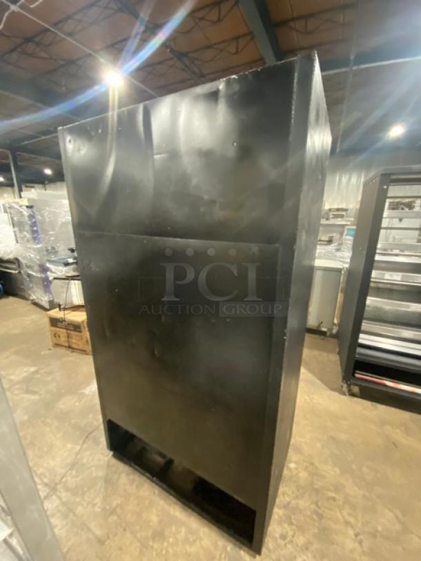 True GDM-37 black double glass sliding door merchandiser refrigerator. Features poly-coated wired racks, 115V, 1 phase.