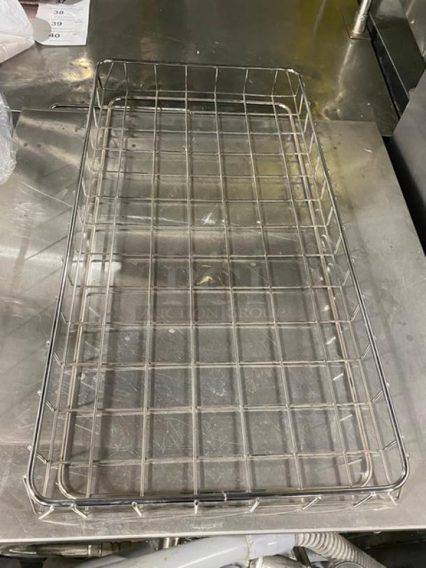 Commercial chrome plated full-sized wired rack for bagels/pastries; grid design, durable construction, excellent condition.