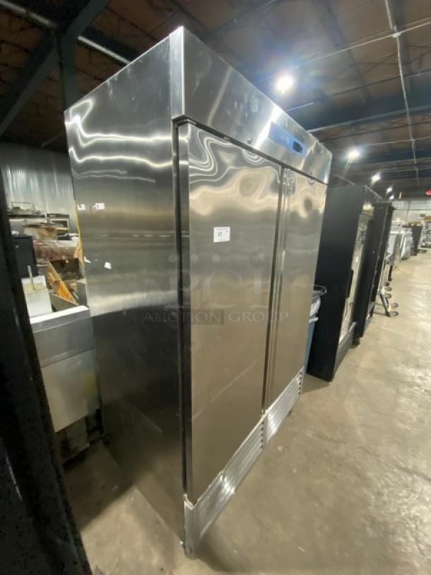 Asber 2022 stainless steel double swing door freezer, model ARF49HFHC, on casters, with poly coated wired rack.