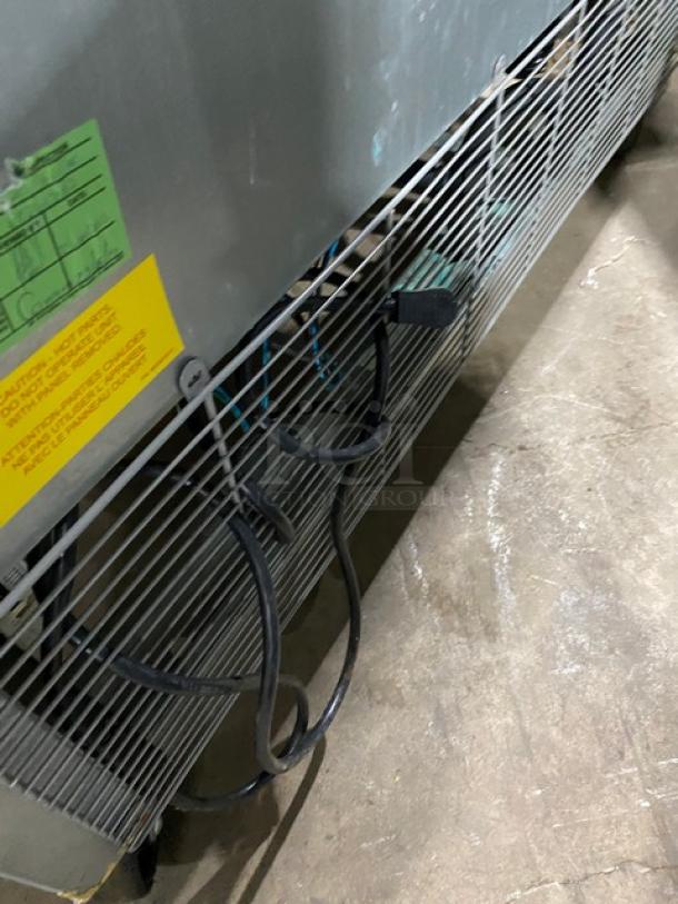 Asber 2022 stainless steel double swing door reach-in freezer, model ARF49HFHC, on casters. Features poly-coated wired rack.