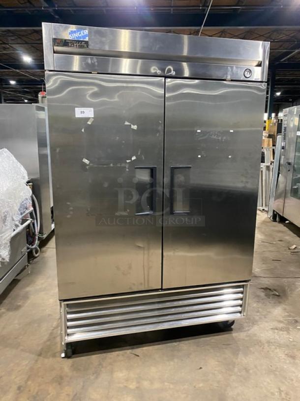 True T-49F Commercial Stainless Steel 2-Door Reach-In Freezer, poly-coated rack, 115V 1 phase, on casters, SN: 1-4757527.