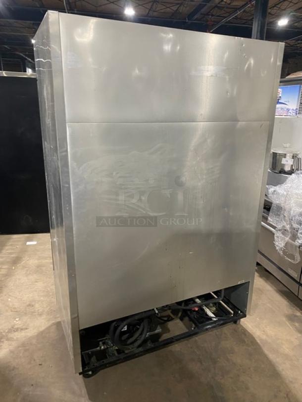 True T-49F Commercial Stainless Steel 2-Door Freezer, poly-coated racks, 115V 1-phase, on casters, in excellent condition.