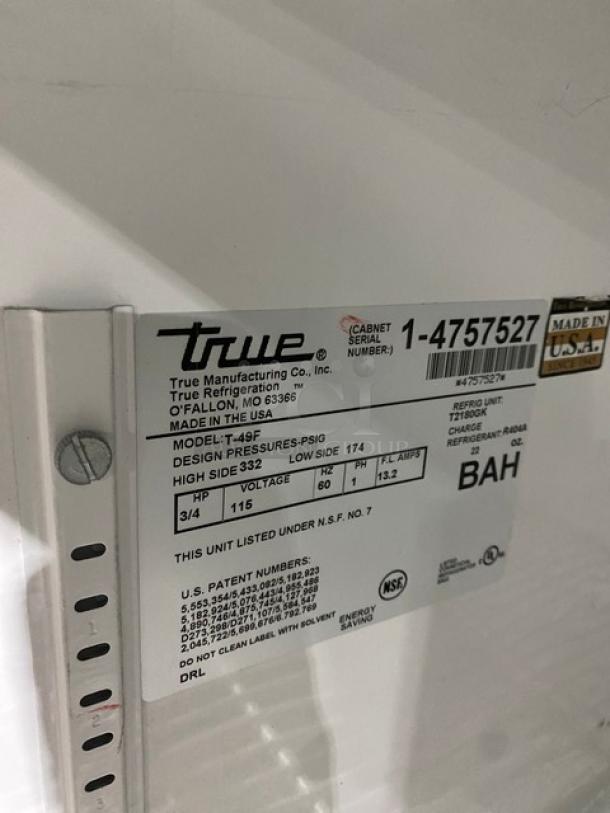 True Commercial T-49F Stainless Steel 2 Door Freezer, Model T-49F, SN: 1-4757527, 115V, on casters, poly coated rack.