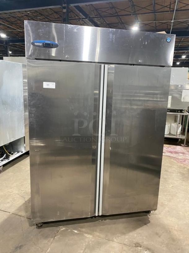 Hoshizaki commercial stainless steel 2-door reach-in refrigerator, Energy Star certified, with poly coated wired racks, 115V 1 phase, on casters.