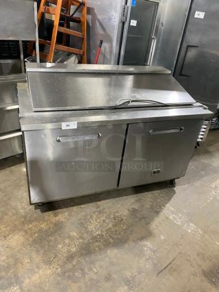 Kelvinator stainless steel 2-door refrigerated prep table, model KCHMT60.24, on casters, 115V, bain marie style, used.