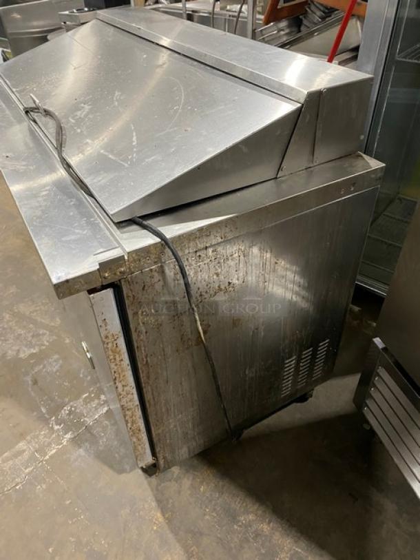 Kelvinator KCHMT60.24 stainless steel 2-door refrigerated bain marie style prep table, 115V, on casters, visible wear.