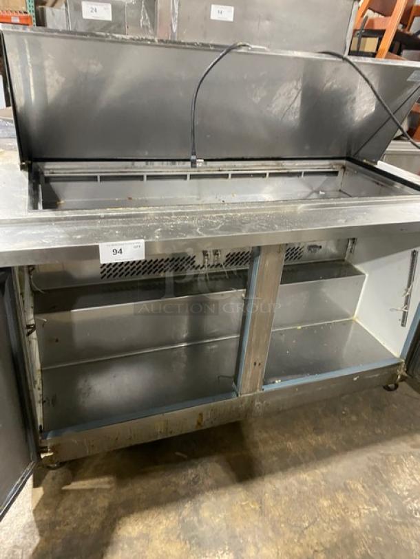 Kelvinator stainless steel 2-door refrigerated prep table, model KCHMT60.24. Bain Marie style, on casters.