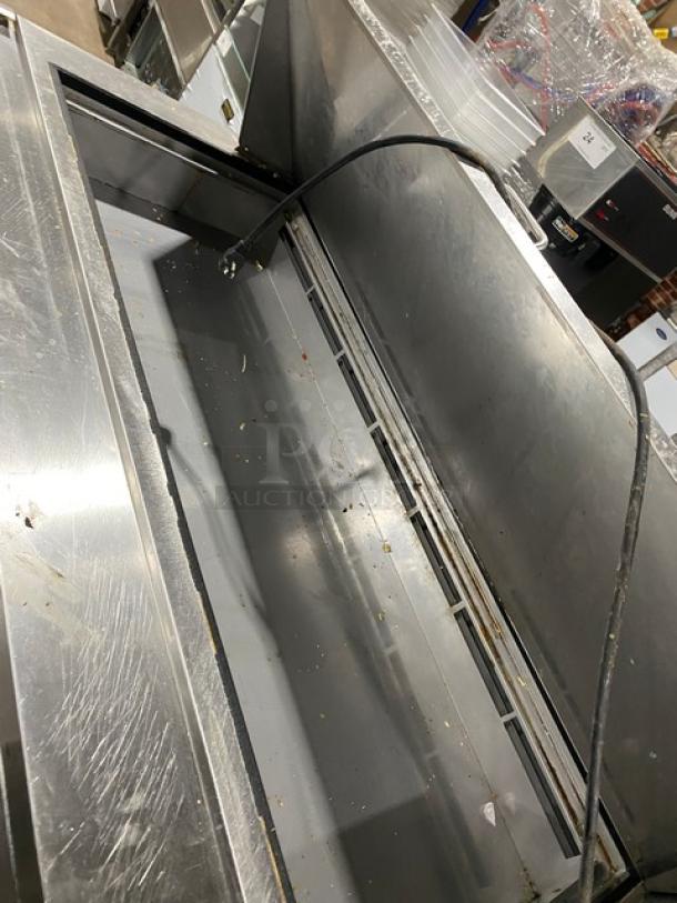 Kelvinator KCHMT60.24 stainless steel refrigerated prep table, 2 doors, bain marie style, on casters, visible use wear.
