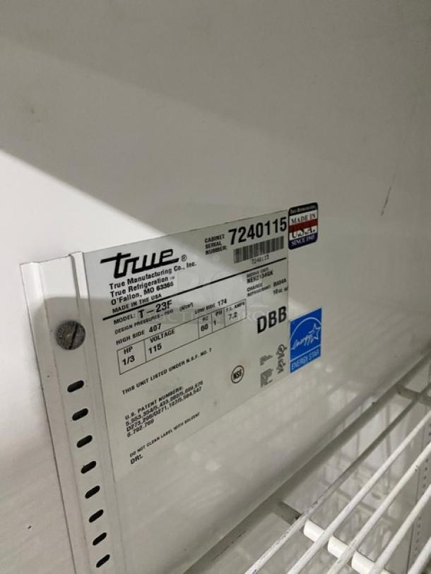 True T-23F single door reach-in freezer tag, SN: 7240115, Energy Star Certified, 115V, on casters, with poly-coated wire rack.