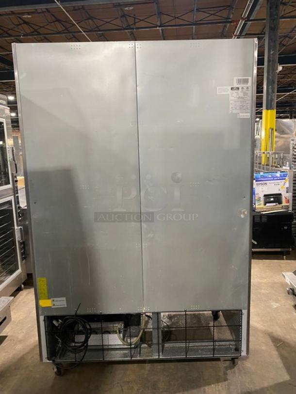 Arctic Air AF49EX stainless steel 2-door reach-in freezer, poly coated wired racks, 115V, on casters, SN: H20041804.