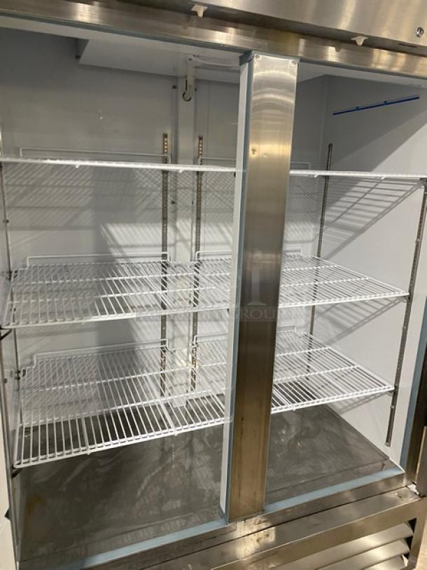 Arctic Air AF49EX stainless steel 2-door freezer with poly-coated racks, model SN: H20041804, on casters, 115V.