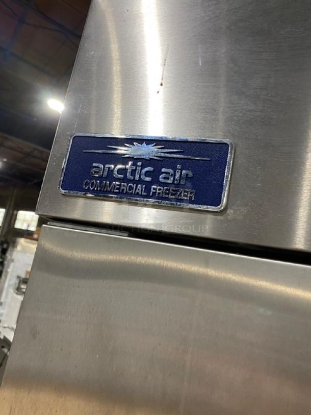 Arctic Air AF49EX stainless steel 2-door reach-in freezer, poly-coated racks, 115V, on casters, model badge visible.