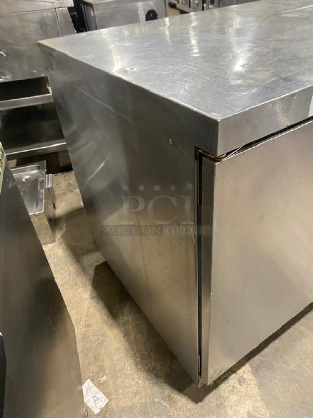 Delfield 4448 stainless steel 2-door undercounter refrigerator, flat top, wired rack included, good condition.