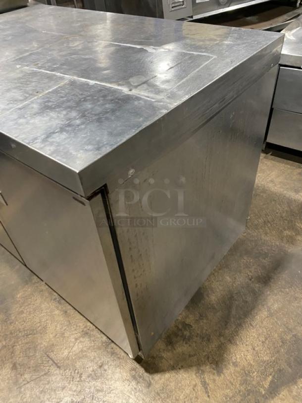 Delfield 4448 commercial stainless steel 2-door undercounter refrigerator with flat top, wired rack, model 4448, SN 405434-T, 115V.