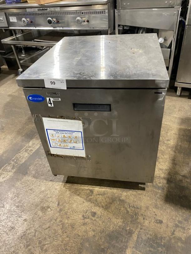 Randell commercial stainless steel undercounter refrigerator with solid single door, poly-coated wire rack, and casters.