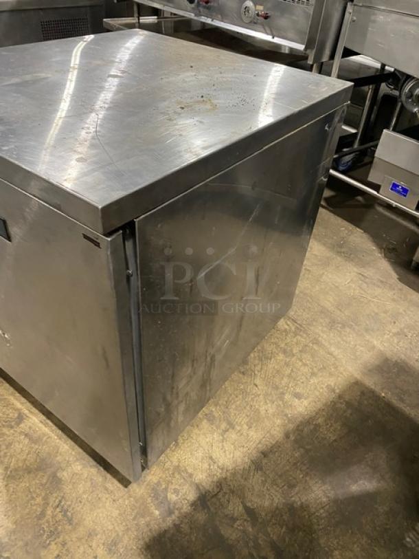 Randell stainless steel undercounter worktop refrigerator, single door, poly coated rack, on casters, commercial use.