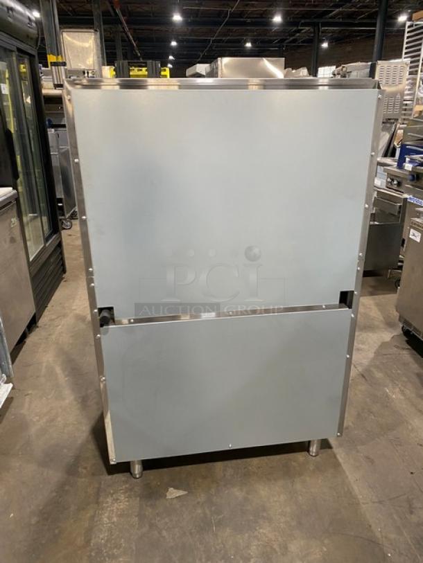 CookRite ATO12G4B stainless steel gas range with flat griddle and 4-burner split top. Includes overhead salamander shelf. New condition.