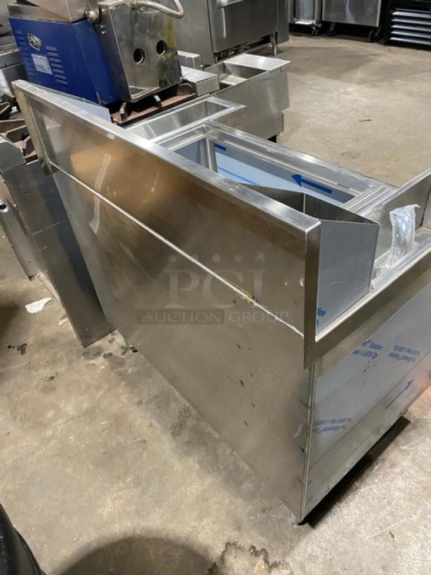 Infinity Casino Series stainless steel underbar ice bin/cocktail station, model ICSS-36-P10-CB-M, with speed rail, new condition.