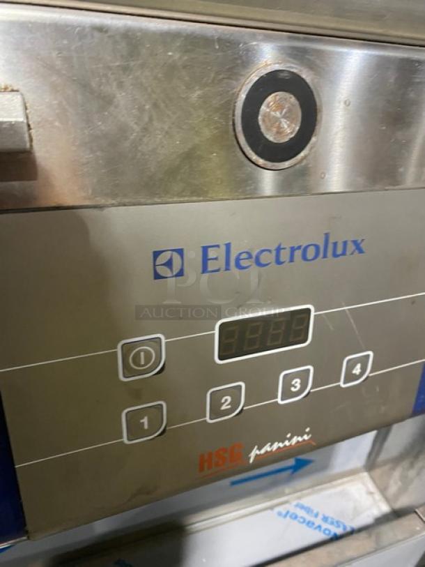 Electrolux HSPPA1 stainless steel panini press, digital controls, used condition, 208V, 1 phase, on legs.