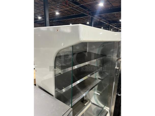 Turbo Air TOM-40W refrigerated merchandiser, white, stainless steel interior, adjustable shelves, excellent condition.
