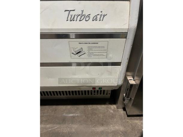 Turbo Air TOM-40W refrigerated open merchandiser; white, stainless steel interior, adjustable shelves, 120V, clean condition.