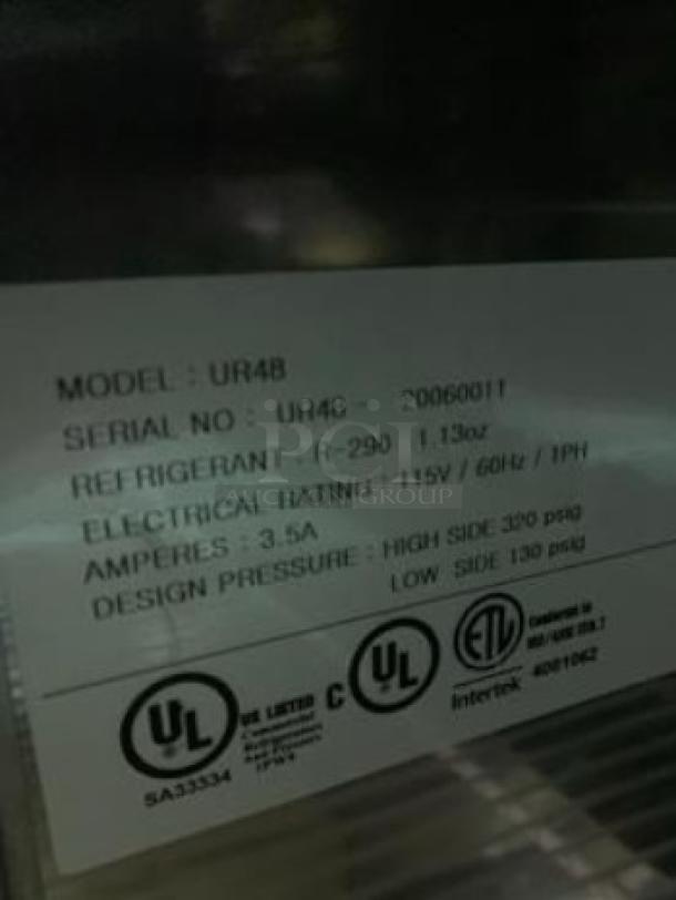 Brand new Migali UR48 undercounter refrigerator label, showing model, serial number, refrigerant, and electrical specs.