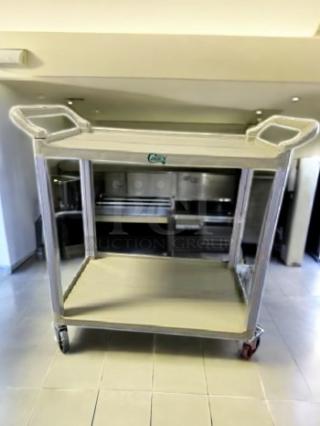 Brand new Choice 3-shelf grey utility cart; durable design, handles on both ends, excellent condition, model tag visible.