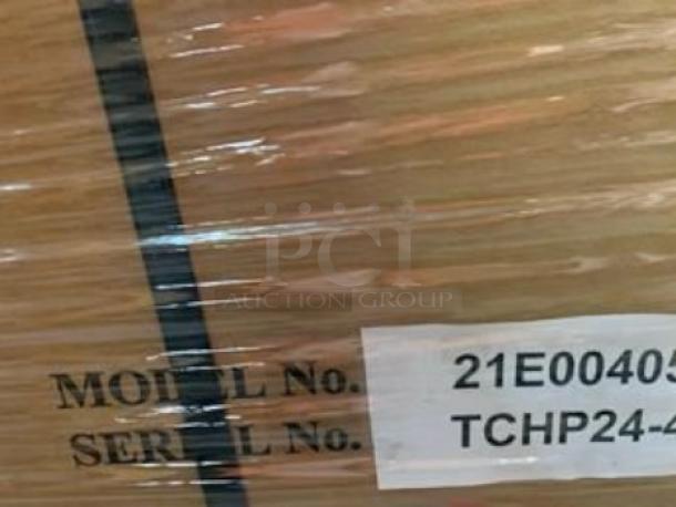 Alt text: Therma-Tek TCHP24-4L new gas hotplate, 4 open burners, stainless steel, model and serial numbers visible on packaging.