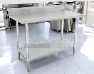 Brand New LAG-304 stainless steel work table, 30"x48", economy series, 5" backsplash, excellent condition.