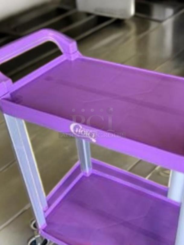 Brand new purple Choice 2-shelf utility cart, excellent condition, with visible logo.