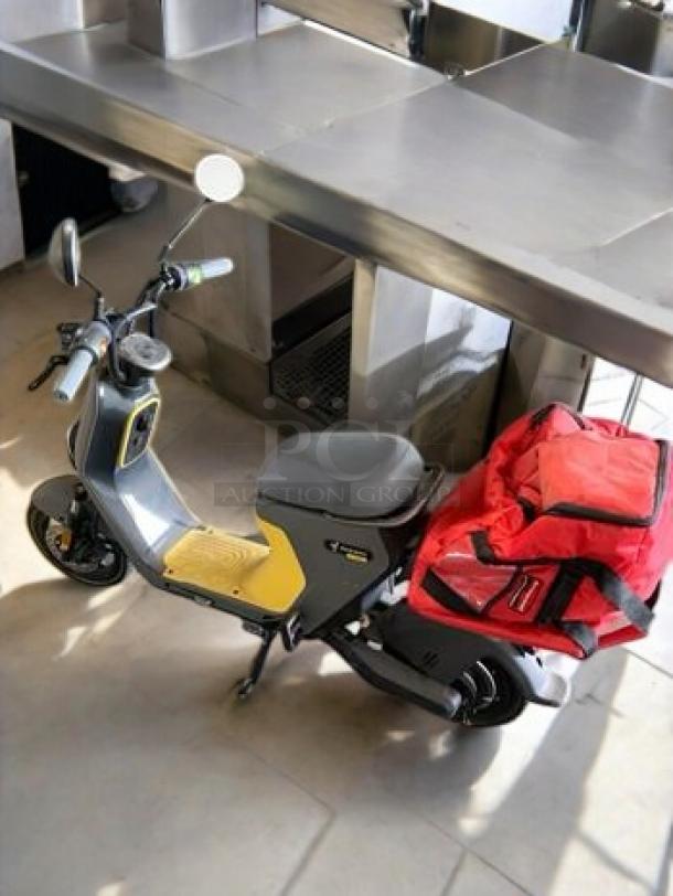 Segway Ninebot eMoped C80 in excellent condition, 750W motor, gray with yellow accents, red bag on seat, fully tested.