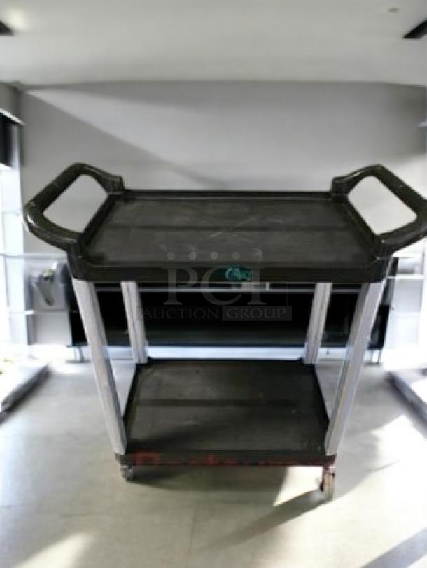 Brand new Choice small 2-shelf bus cart in black, excellent condition. Durable utility/service cart with ergonomic handles.