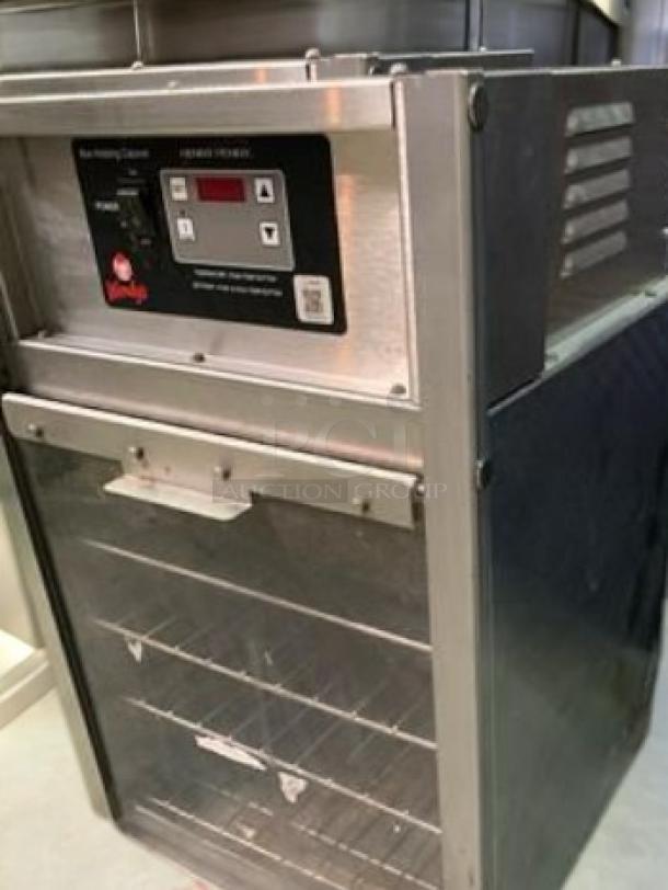 Henny Penny BW100 Bun Holding Cabinet, stainless steel, excellent condition, tested, 120V, digital controls, shelves visible.