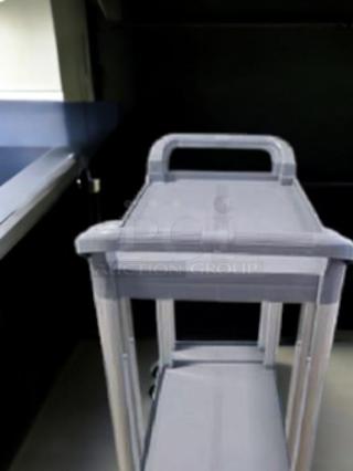 Brand new Choice 2-shelf utility bus cart, gray, fully tested, model features durable construction and ergonomic handles.