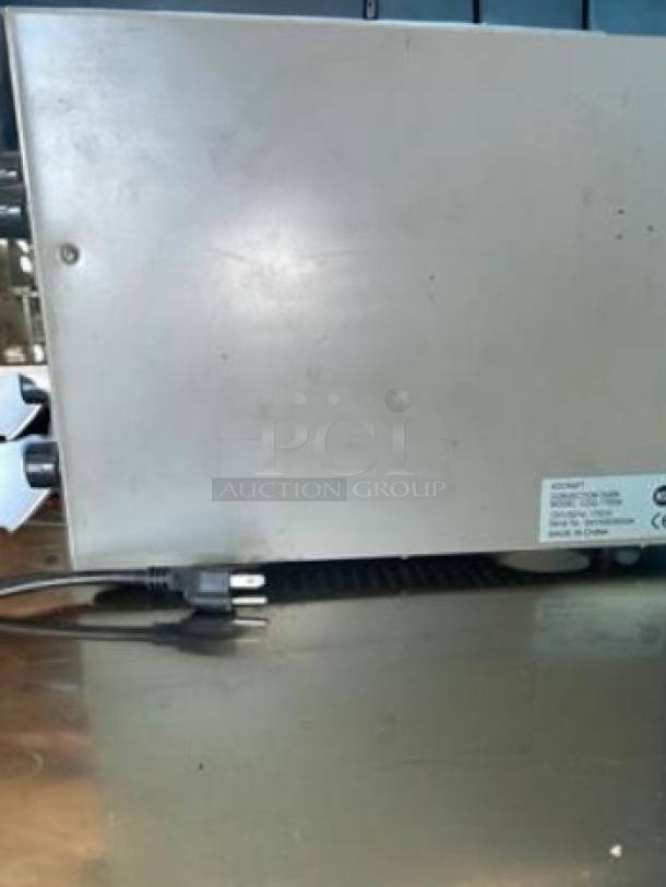 Adcraft COQ-1750W convection oven, excellent condition, 120V/1750W. Fully tested, side view with label visible.