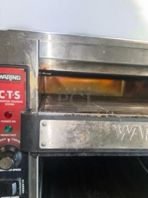 Waring Commercial CTS1000 Conveyor Toaster, 120V, 1800W, excellent condition, fully tested, stainless steel exterior, controls visible.