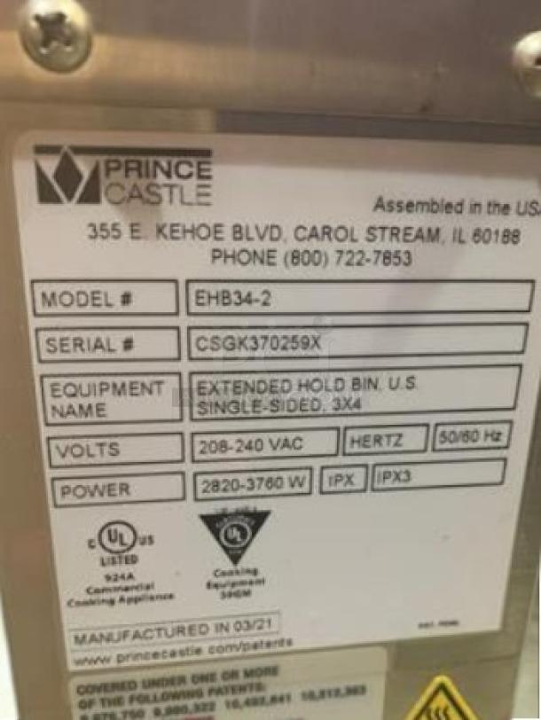 Prince Castle EHB34-2 Extended Hold Bin label, model EHB34-2, serial CSGK370259X, 208–240V, single-sided 3×4 configuration.