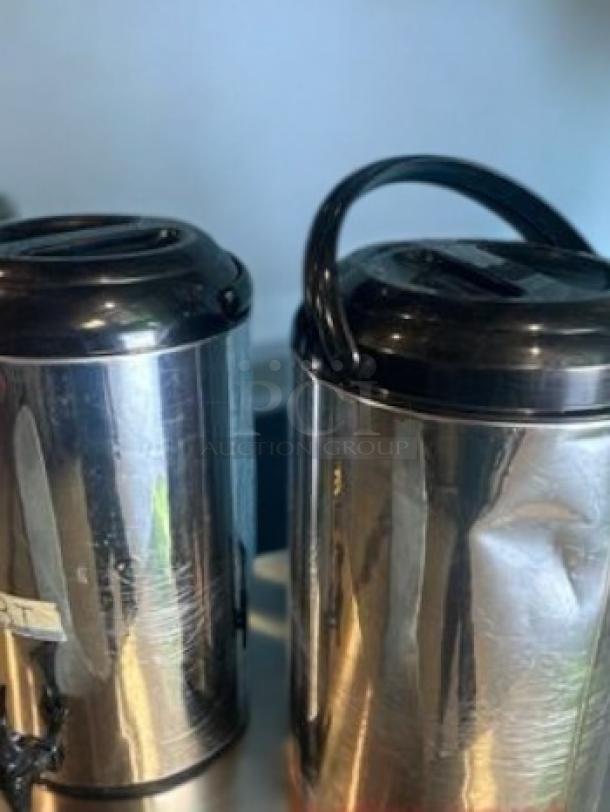 Two stainless steel hot/cold beverage dispensers, commercial-grade, excellent condition, tested and fully working.