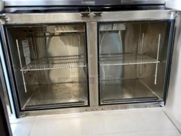 Glastender commercial back bar cooler with double glass doors, excellent condition, 115V AC, model features wire shelving.