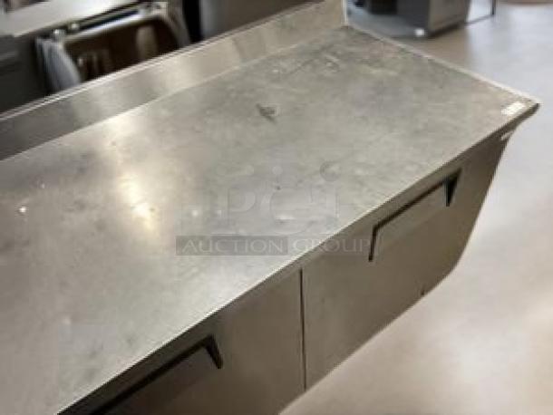 True TUC-60 Undercounter Refrigerator, excellent condition, two solid doors, stainless steel finish, fully tested.