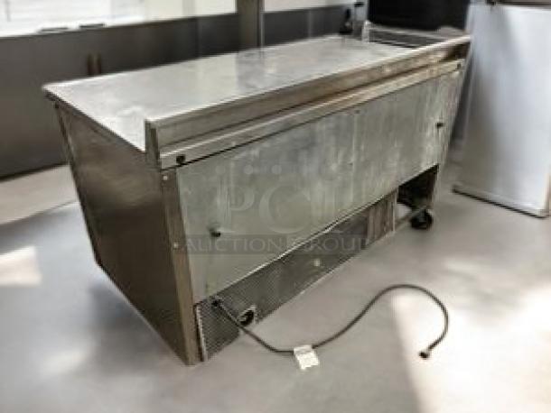 True TUC-60 undercounter refrigerator with 2 solid doors, excellent condition, fully tested, power cord visible.