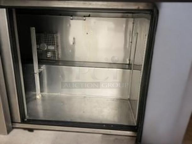 True TUC-60 undercounter refrigerator, excellent condition, two solid doors, stainless interior, fully tested and working.