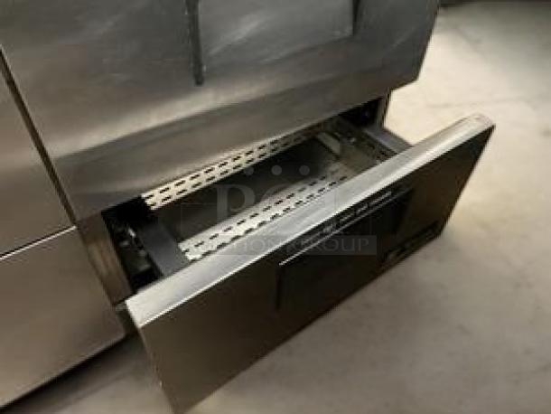 Stainless steel refrigerated chef base with two open drawers, 115V AC, fully tested and working, excellent condition.
